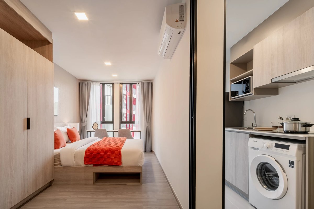 The Base Bukit — show unit bedroom with building view
